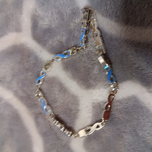 Blue enamel and crystal infinity bracelet. - Picture 12 of 14